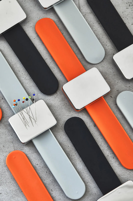 Magnetic bracelet pin holder
